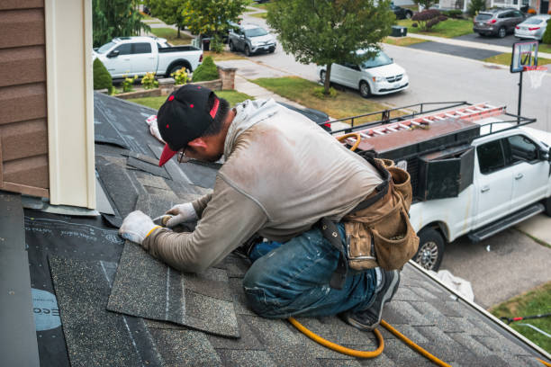 Professional Roof Leak Repair technician working in Hinton, OK